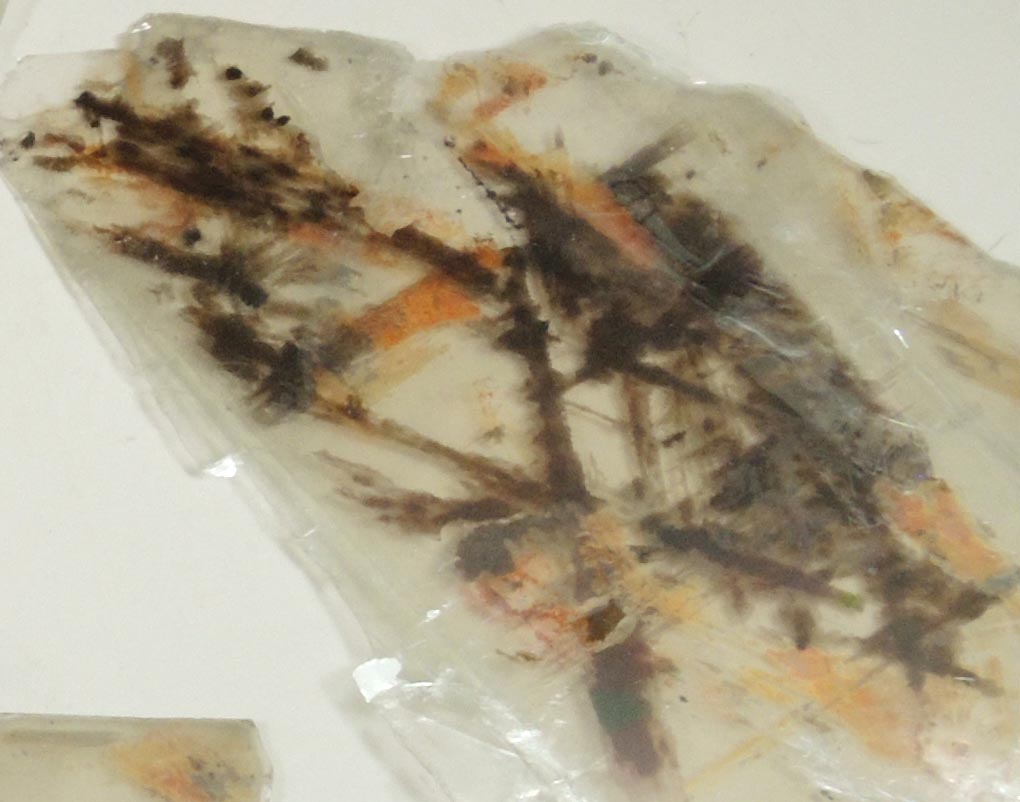 Detail view of mineral Muscovite with oriented magnetite, rutile, hematite inclusions for sale from 93rd Street at Riverside Drive, Manhattan Island, New York City, New York County, New York