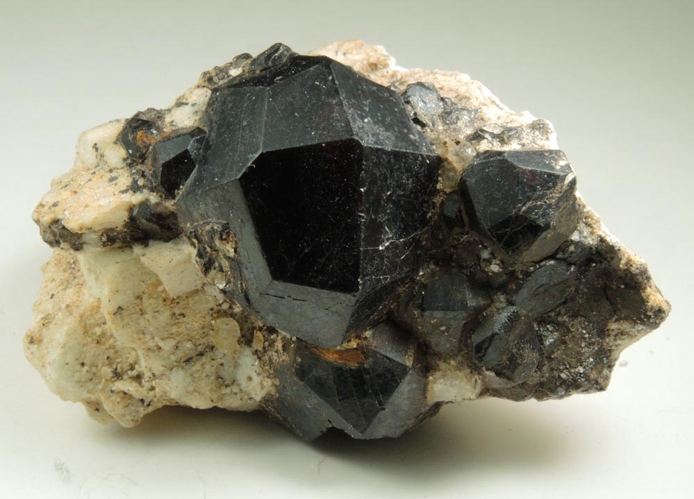 Detail view of mineral Almandine Garnet for sale from Broadway at 36th Street, Manhattan Island, New York City, New York County, New York